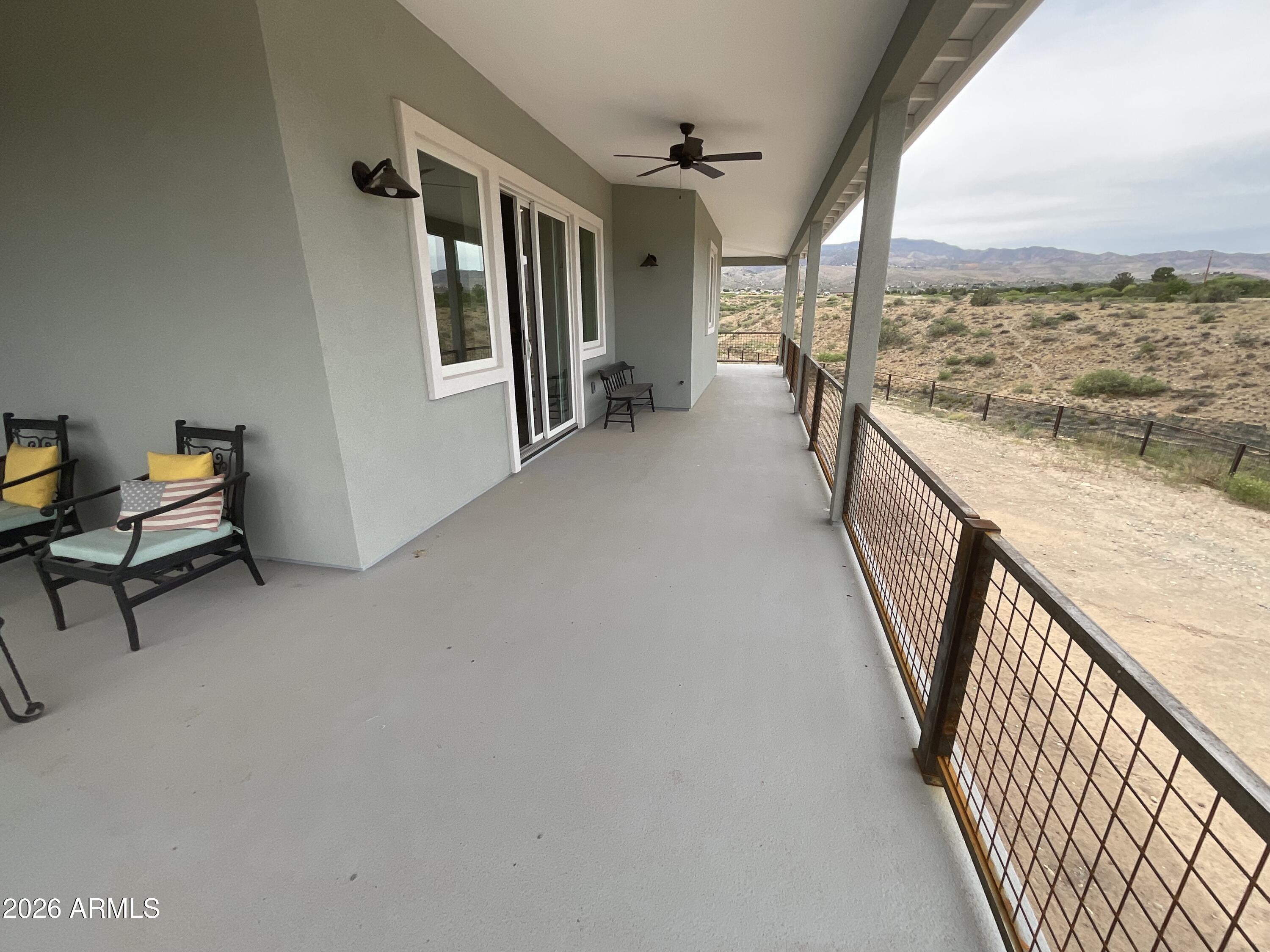 498 Kindra Heights Road Cottonwood, AZ 86326 - Photo 19 of 37 a view of a hallway with furniture and stairs