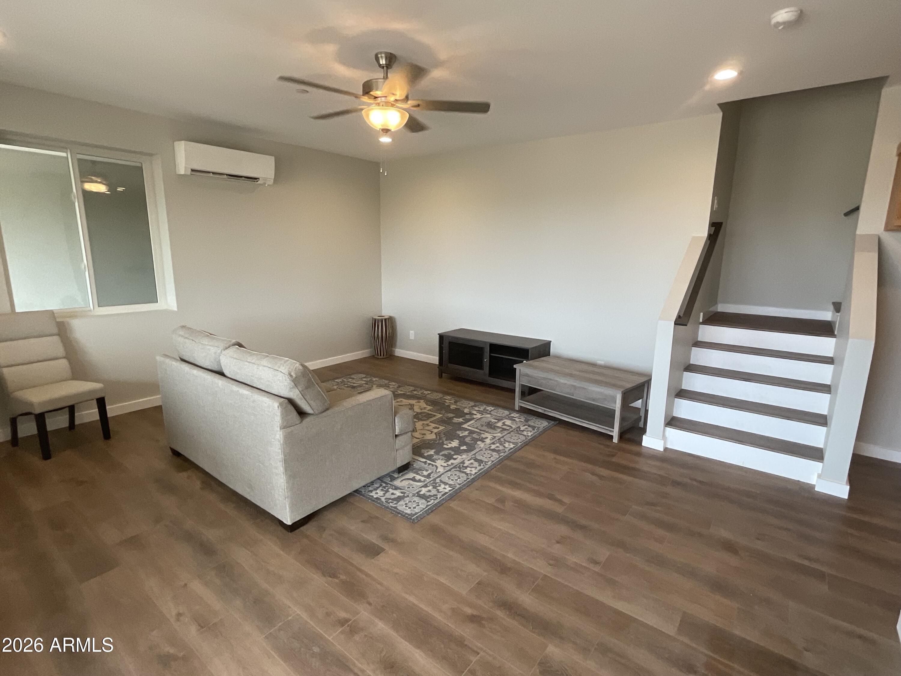 498 Kindra Heights Road Cottonwood, AZ 86326 - Photo 25 of 37 a living room with furniture and a wooden floor