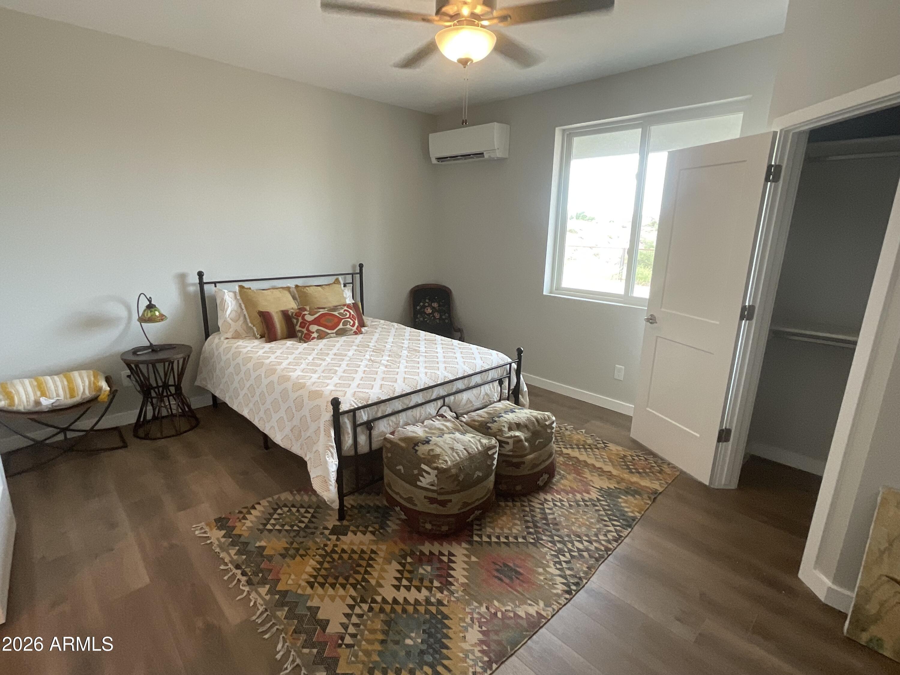 498 Kindra Heights Road Cottonwood, AZ 86326 - Photo 27 of 37 a bedroom with furniture and a window