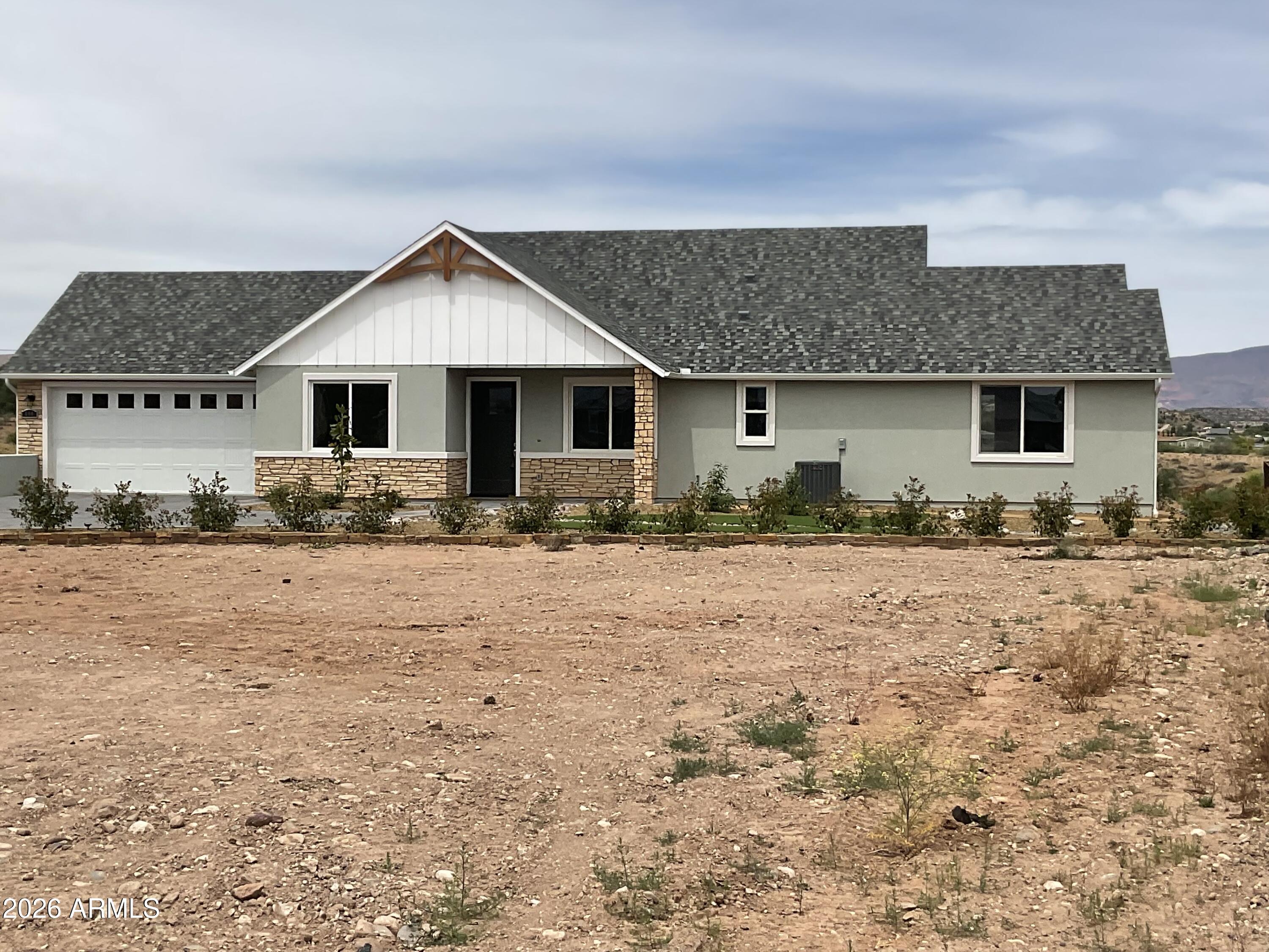498 Kindra Heights Road Cottonwood, AZ 86326 - Photo 36 of 37 a front view of house with yard and trees around