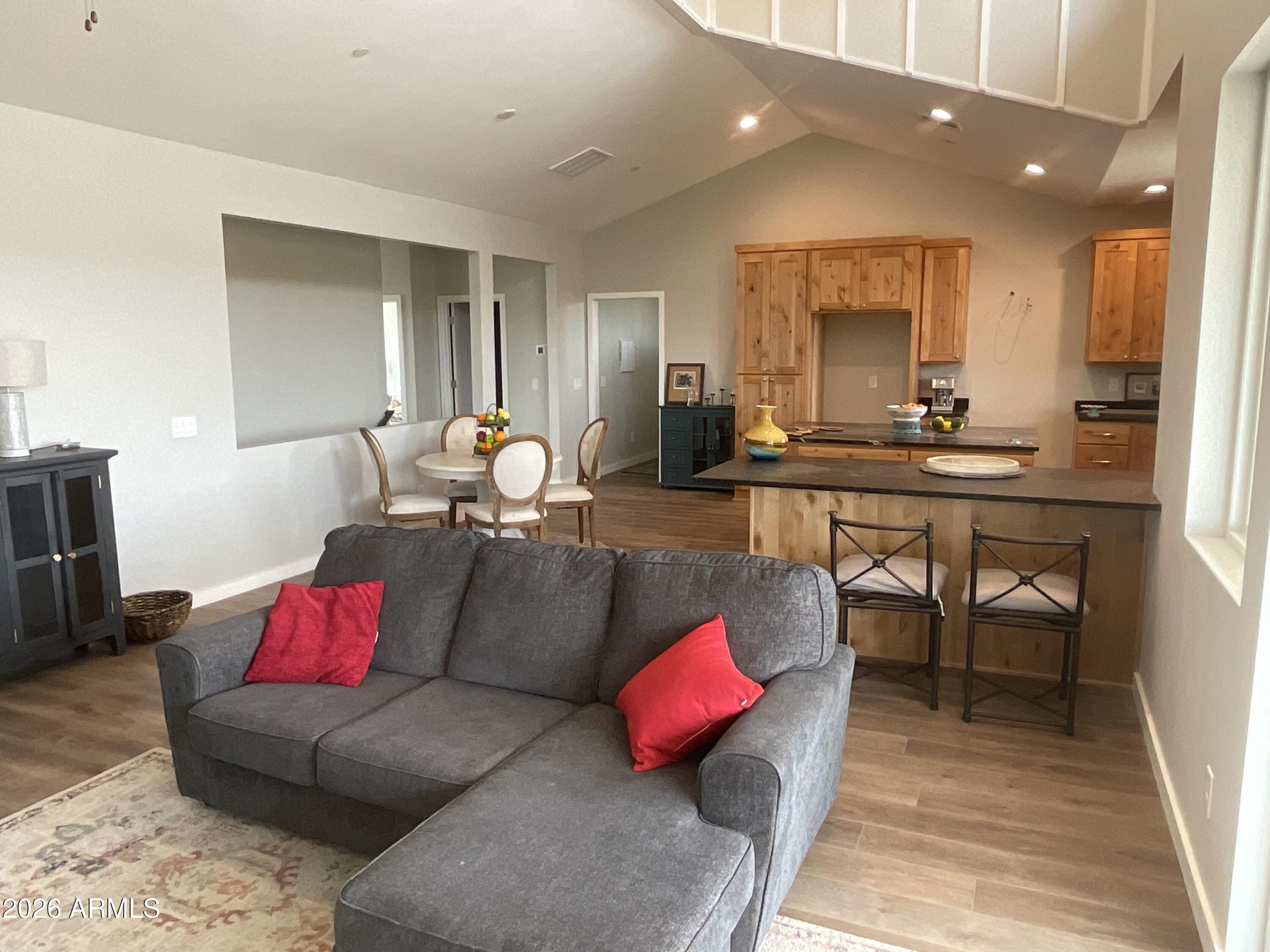 498 Kindra Heights Road Cottonwood, AZ 86326 - Photo 4 of 37 a living room with furniture and kitchen view