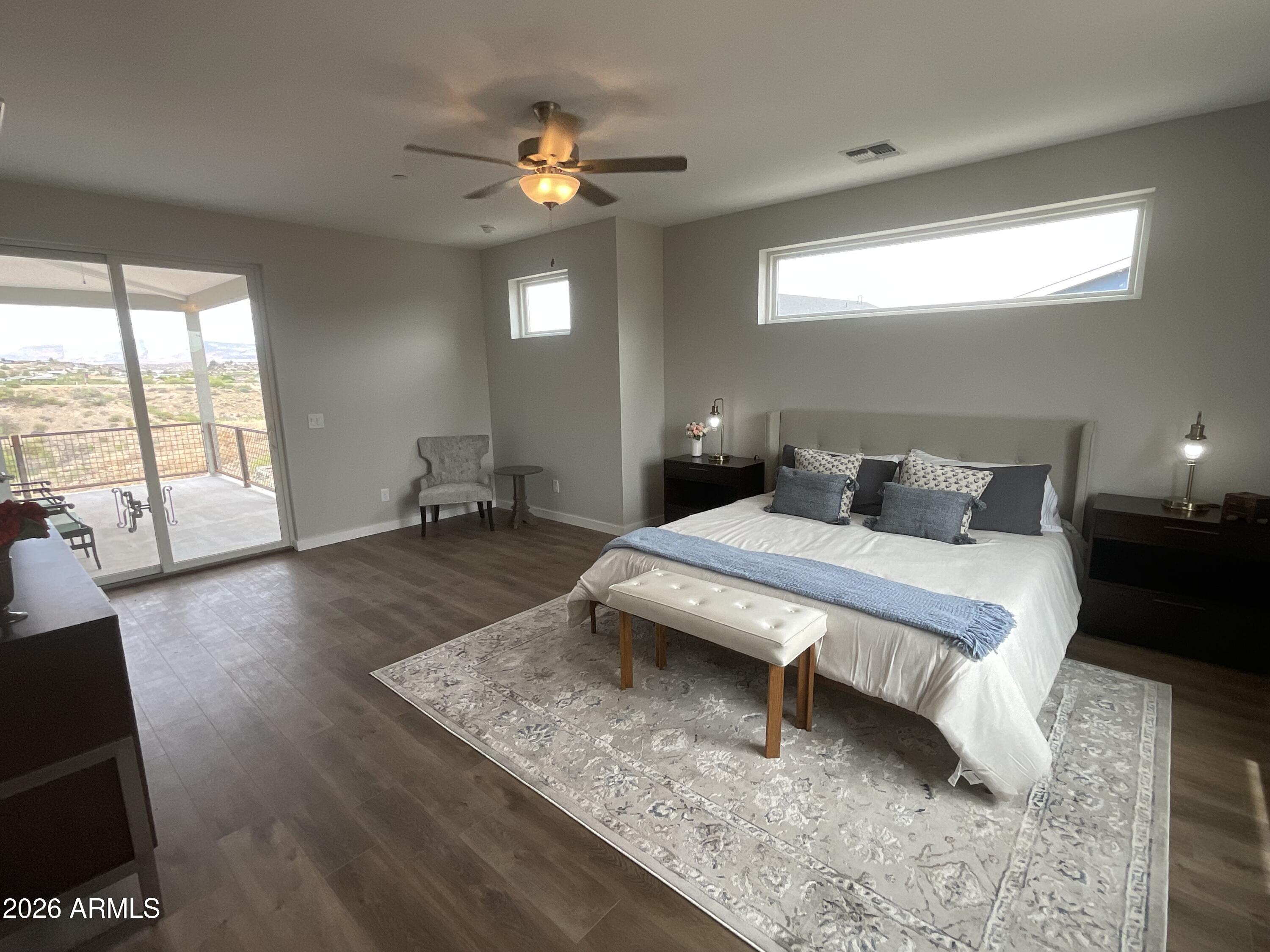 498 Kindra Heights Road Cottonwood, AZ 86326 - Photo 8 of 37 a bedroom with a bed and window