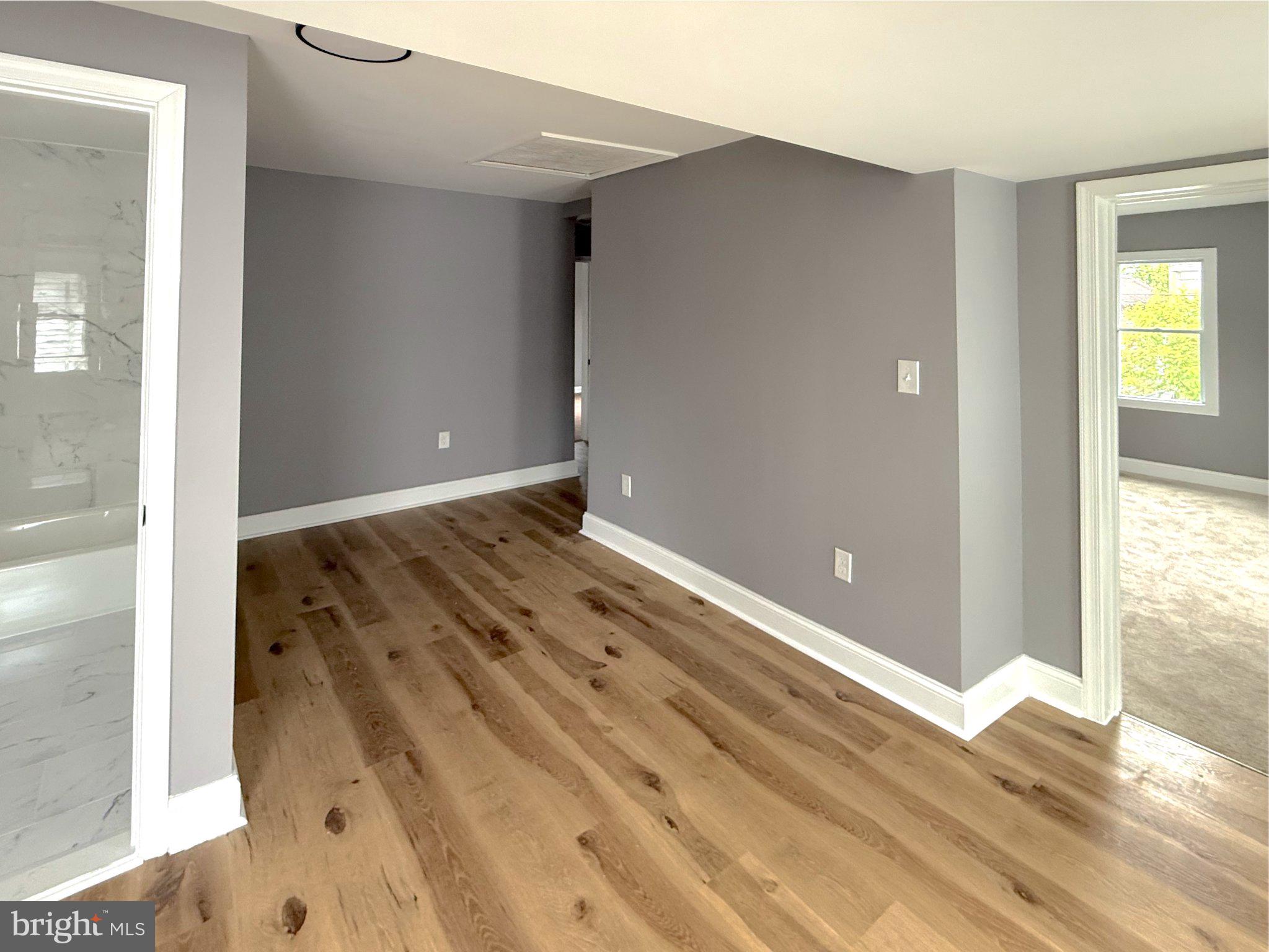 3703 6th Street, Unit 2 Baltimore, MD 21225 - Photo 17 of 20 Bright, modern space with warm tones.