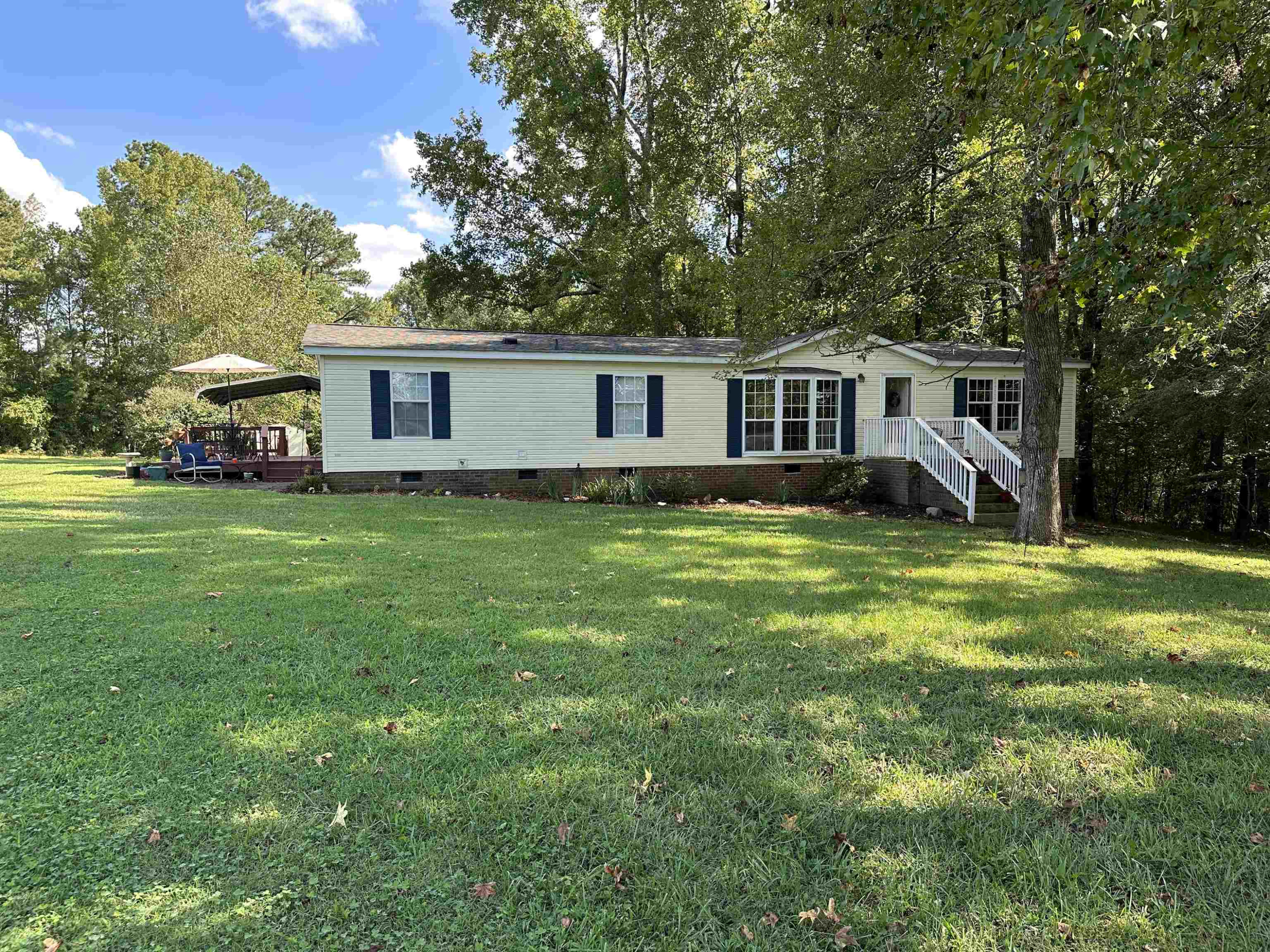 2048 Stoneridge Drive Stem, NC 27581 - Photo 5 of 6 a view of a house with a yard