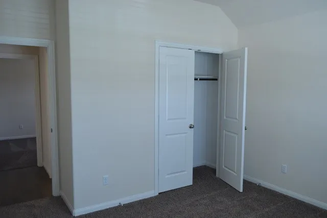 a bathroom with a sink a mirror and a shower