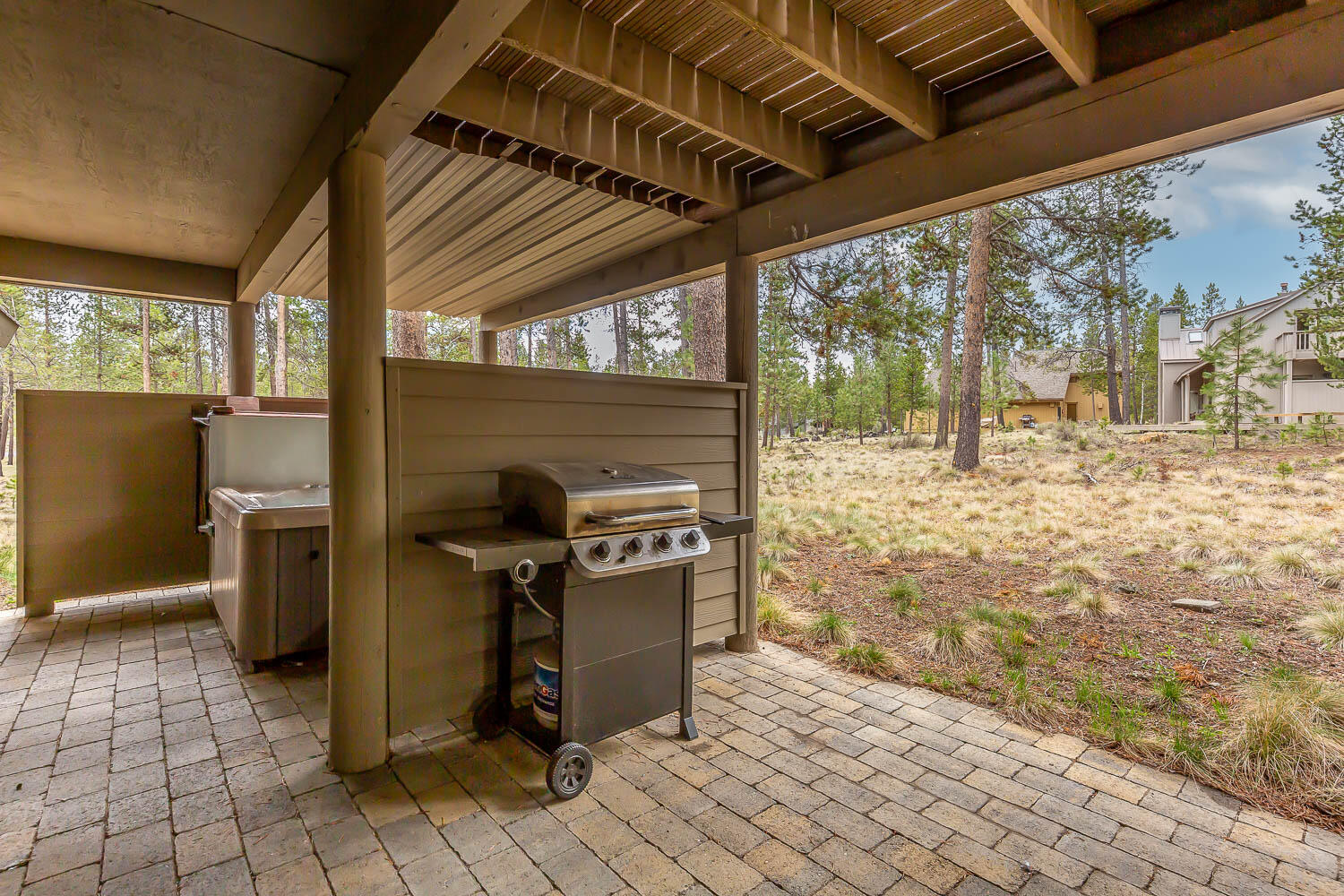57781 Blue Goose Lane, Unit 4 Sunriver, OR 97707 - Photo 25 of 36 Hot tub and patio