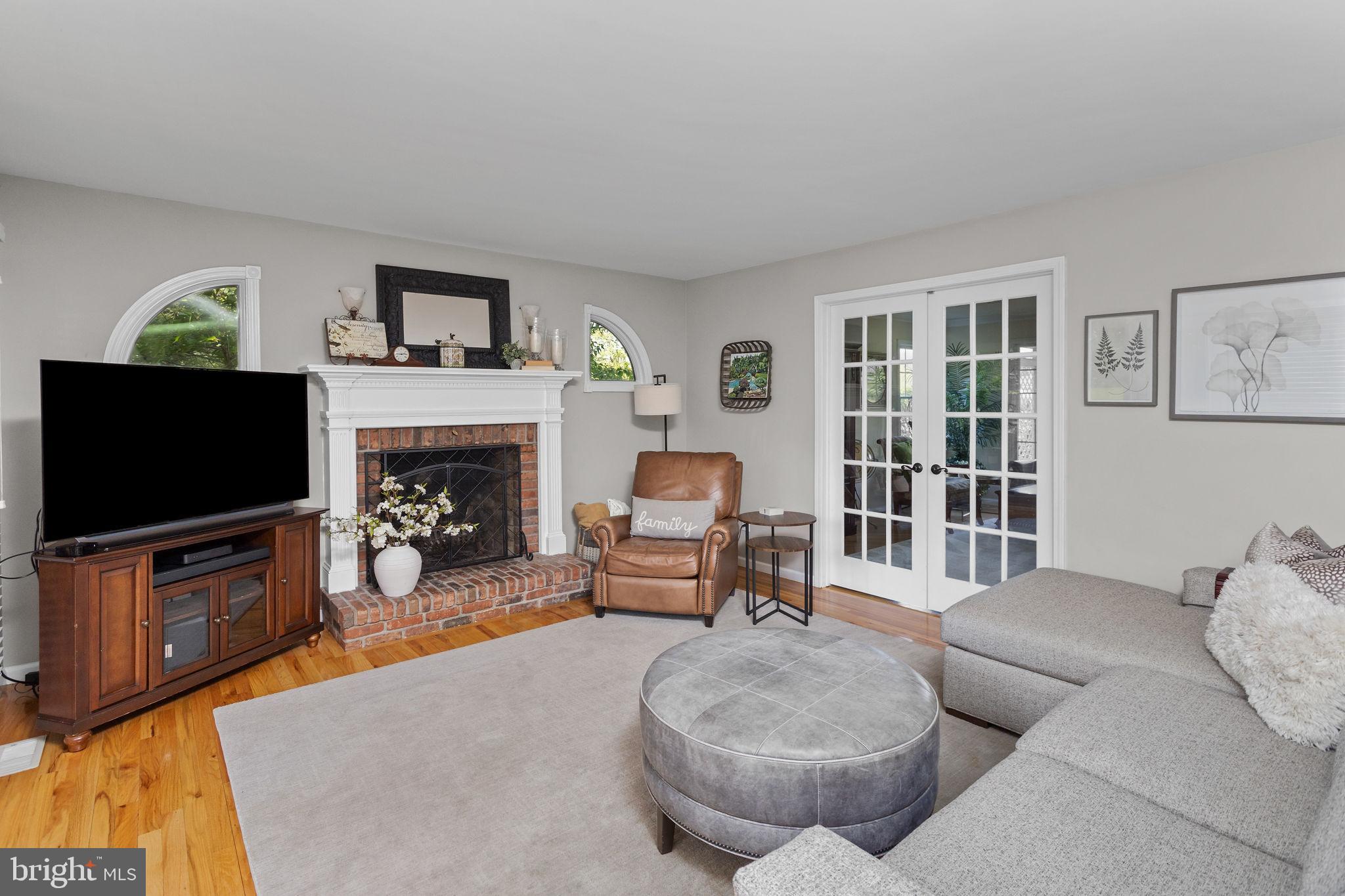 44 Walters Road Robbinsville, NJ 08691 - Photo 26 of 68 a living room with furniture and a flat screen tv