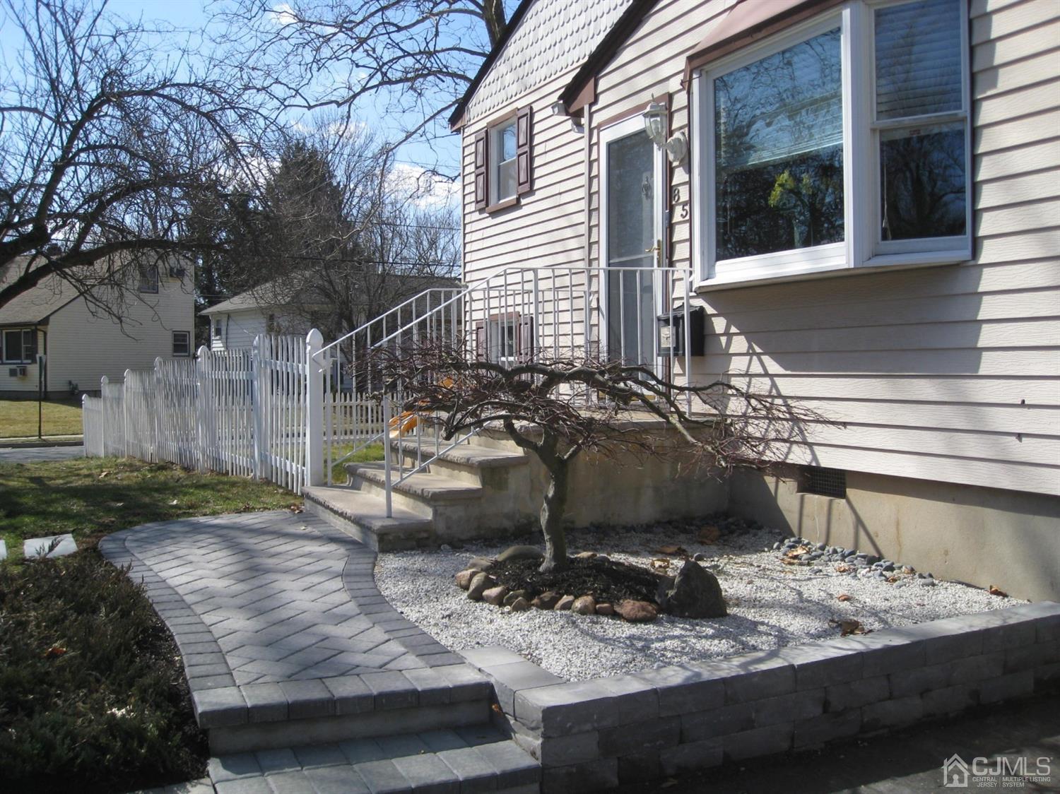 85 Willow Road Metuchen, NJ 08840 - Photo 2 of 21 Exterior front - New paver sidewalk welcomes you