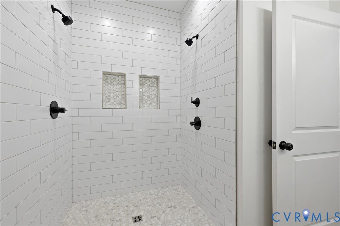5888 Cartersville Road New Canton, VA 23123 - Photo 18 of 33 a bathroom with a shower