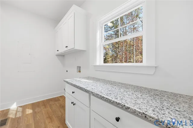 a view of cabinets and window