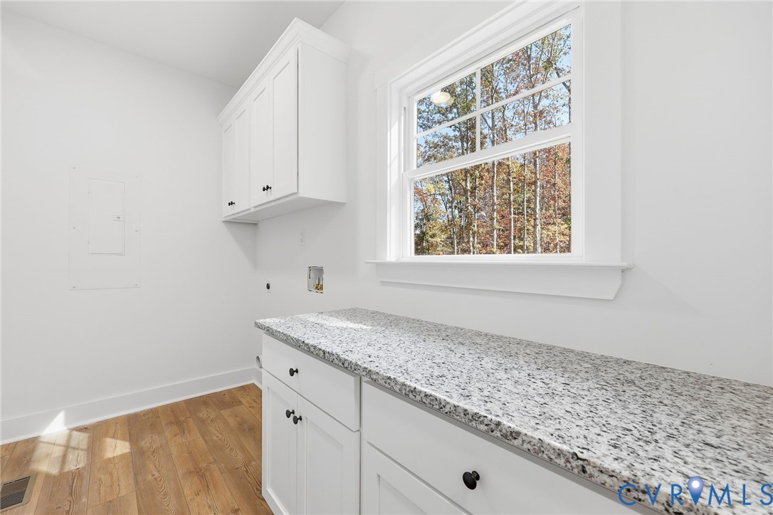 5888 Cartersville Road New Canton, VA 23123 - Photo 27 of 33 a view of cabinets and window
