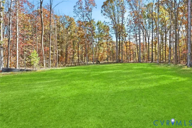 a view of a balcony with wooden floor