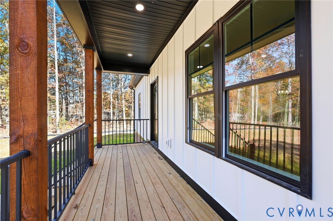 5888 Cartersville Road New Canton, VA 23123 - Photo 33 of 33 a view of a balcony with wooden floor
