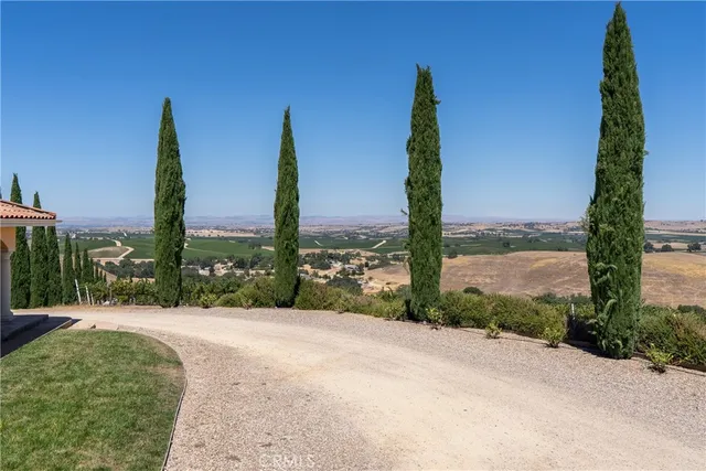 a bathroom with a sink a mirror a toilet and a shower