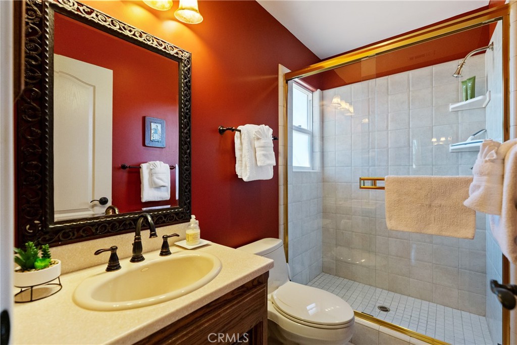 725 Spring Creek Way Templeton, CA 93465 - Photo 44 of 70 a bathroom with a sink toilet and shower