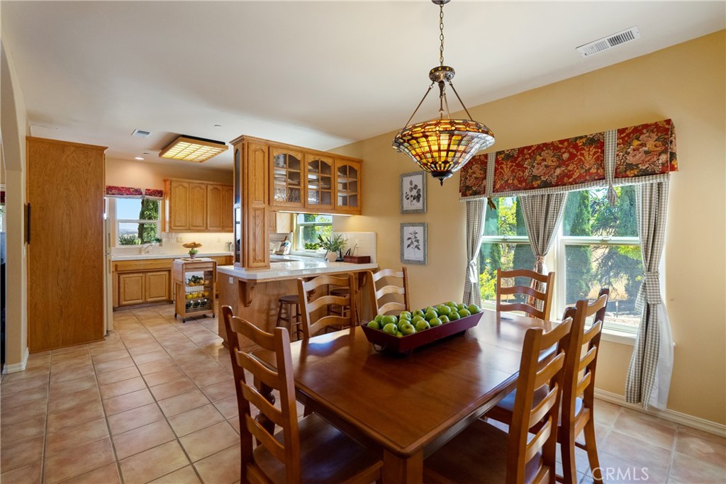 725 Spring Creek Way Templeton, CA 93465 - Photo 50 of 70 a view of a dining room with furniture window and outside view