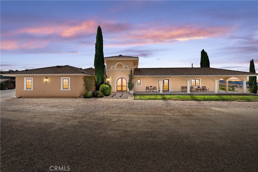 725 Spring Creek Way Templeton, CA 93465 - Photo 64 of 70 a front view of a house with a garden