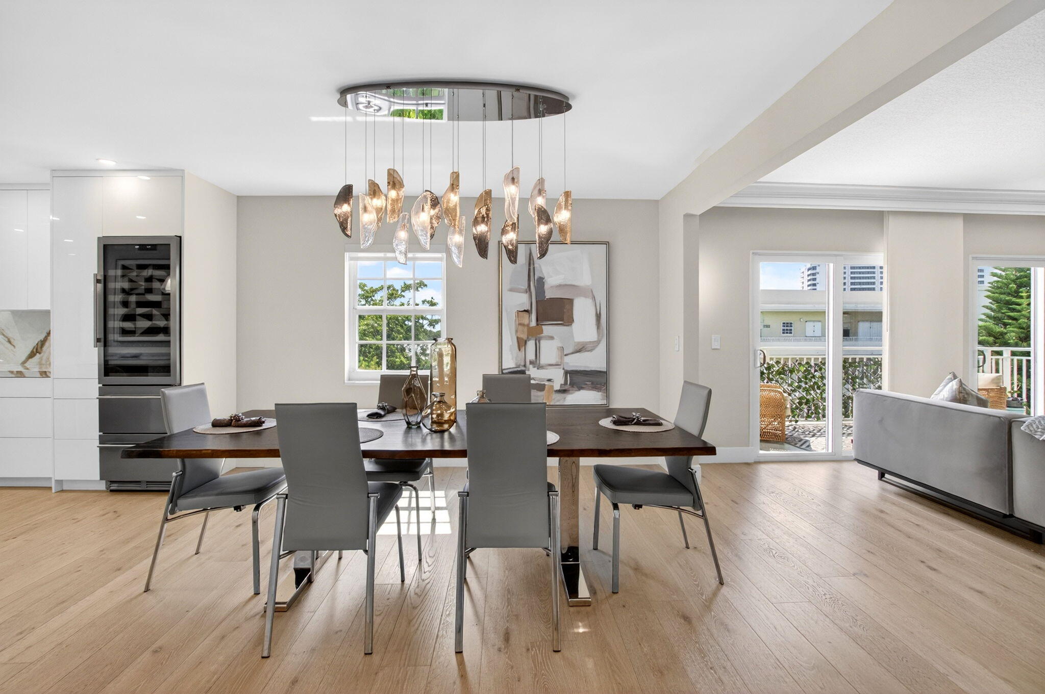 950 De Soto Road, Unit 5A Boca Raton, FL 33432 - Photo 6 of 98 a view of a dining room with furniture window and wooden floor