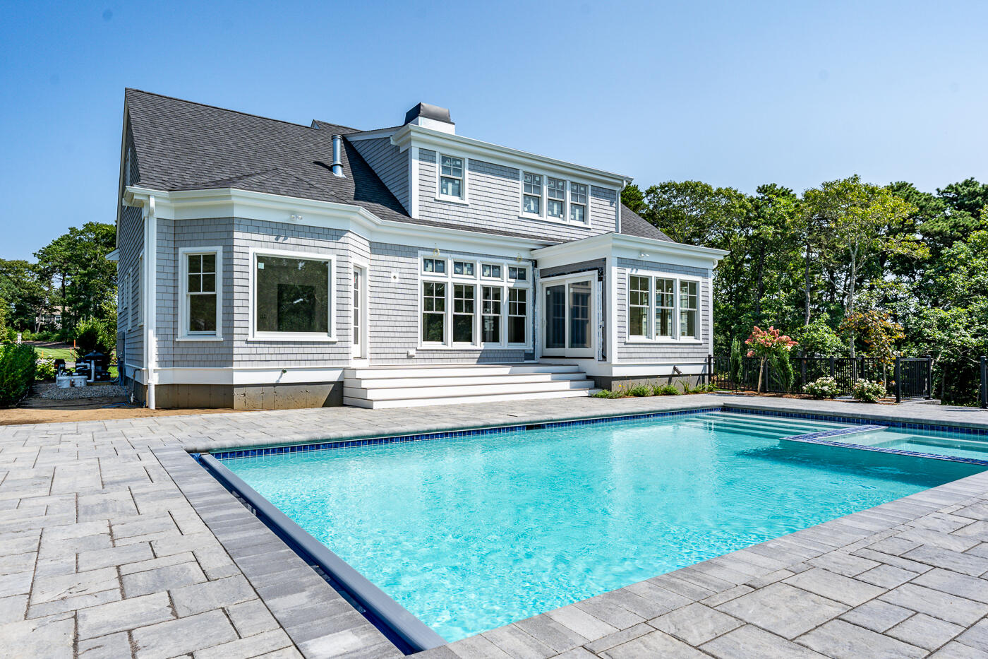 8 Bascom Hollow Harwich, MA 02645 - Photo 6 of 13 a view of a house with swimming pool and sitting area