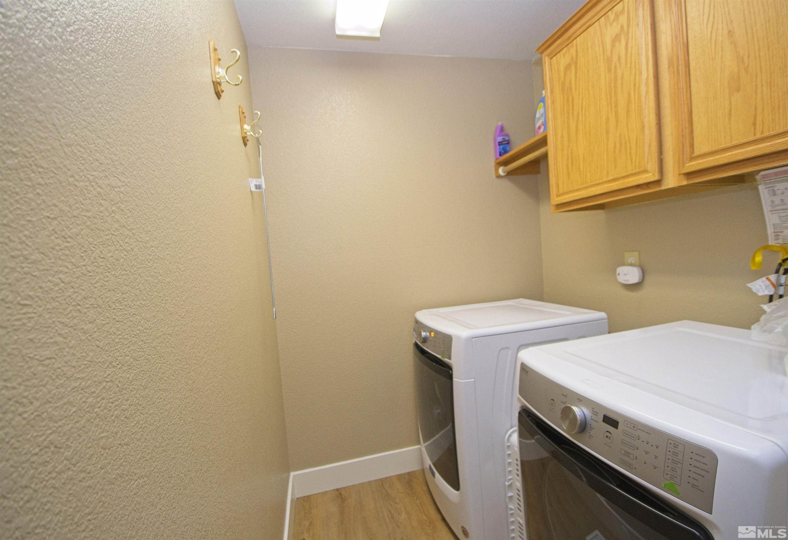 74 River Front Drive Reno, NV 89523 - Photo 18 of 28 a utility room with dryer and washer