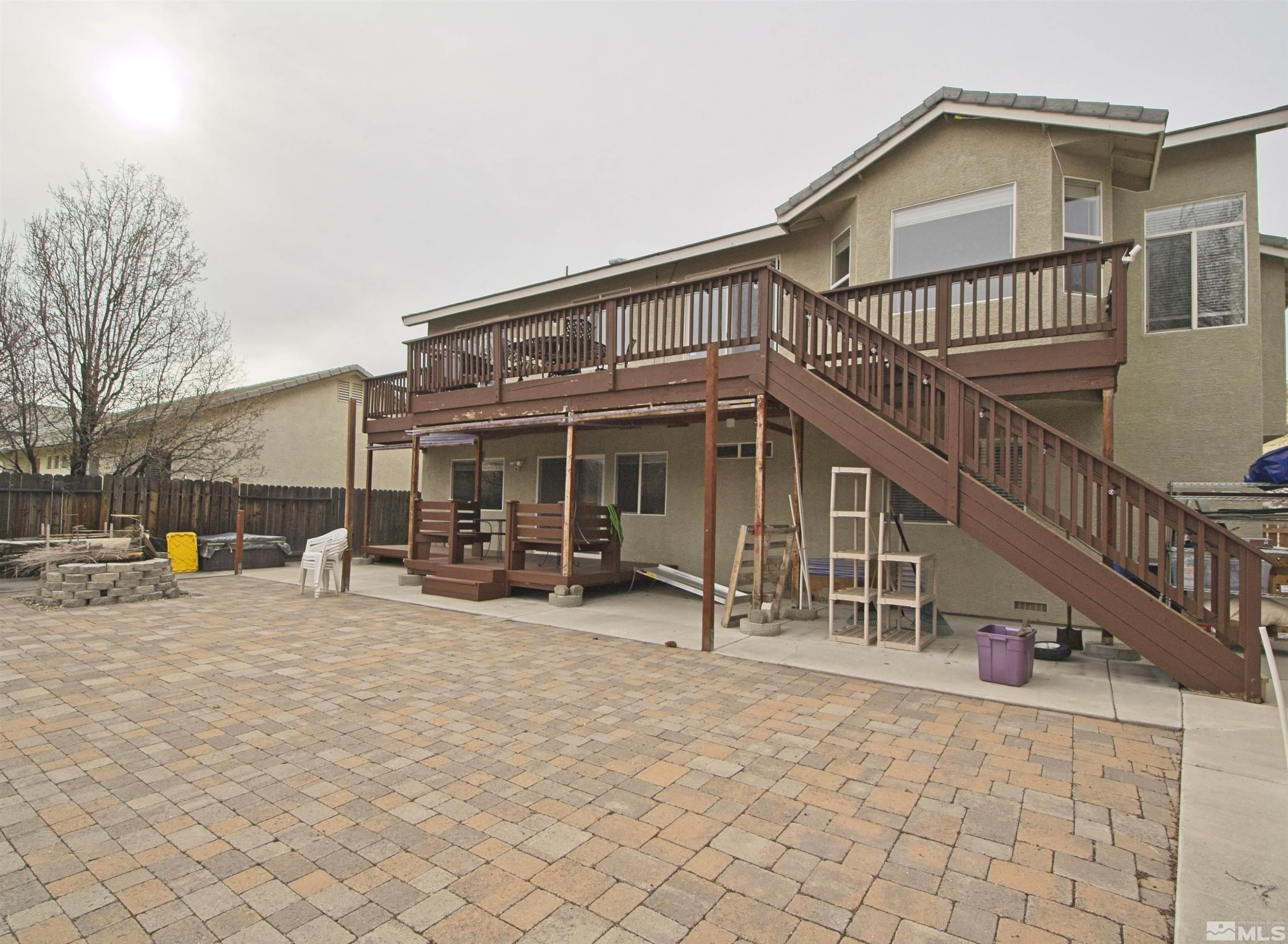74 River Front Drive Reno, NV 89523 - Photo 24 of 28 a view of a house with backyard porch and sitting area