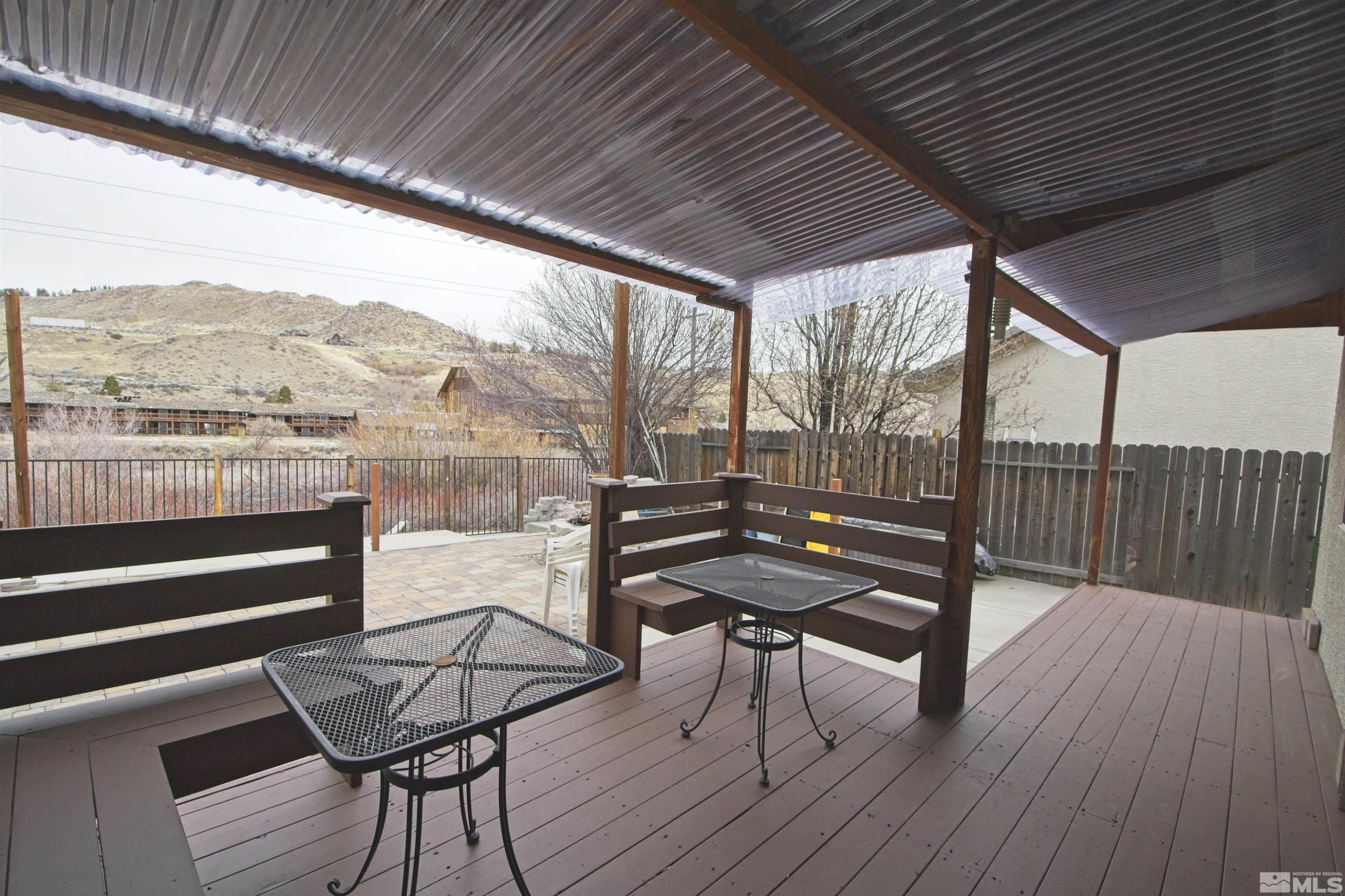 74 River Front Drive Reno, NV 89523 - Photo 25 of 28 a view of a balcony with furniture and wooden floor