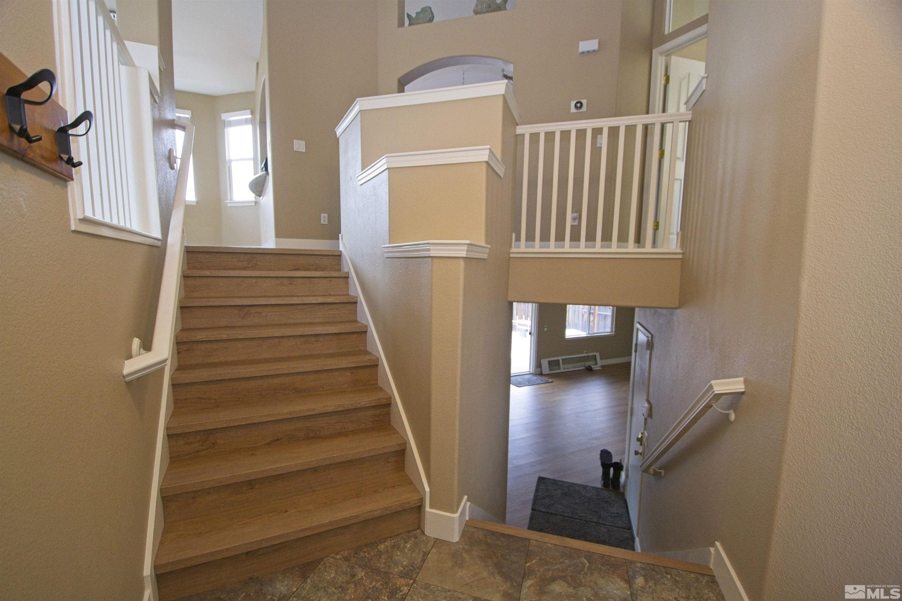 74 River Front Drive Reno, NV 89523 - Photo 26 of 28 a view of entryway and hall with wooden floor