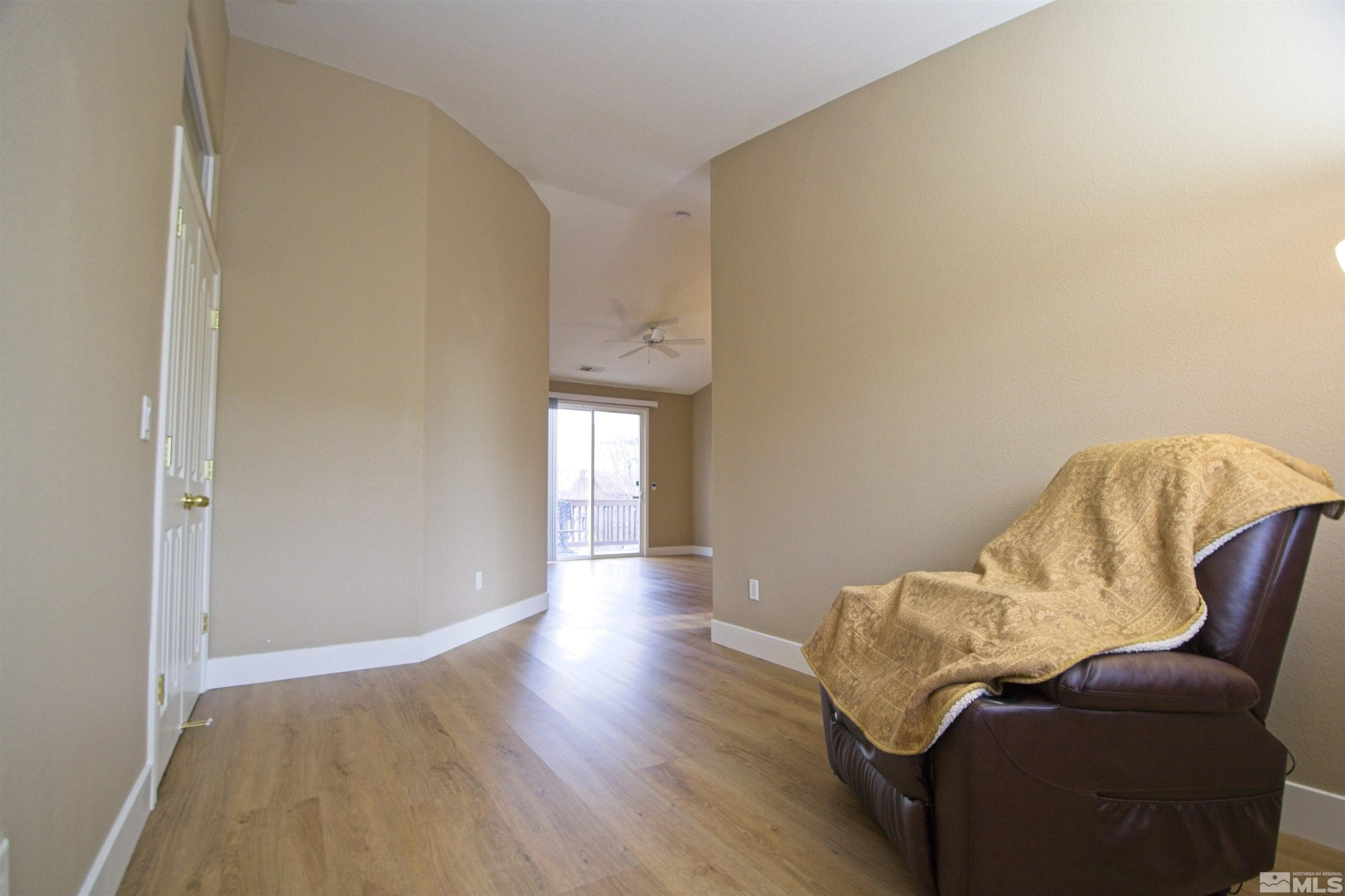 74 River Front Drive Reno, NV 89523 - Photo 10 of 28 a view of a livingroom with furniture and wooden floor