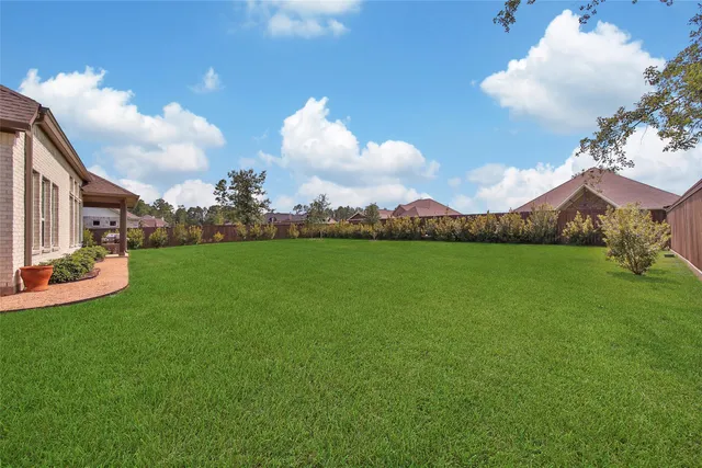 a view of a street with an outdoor seating