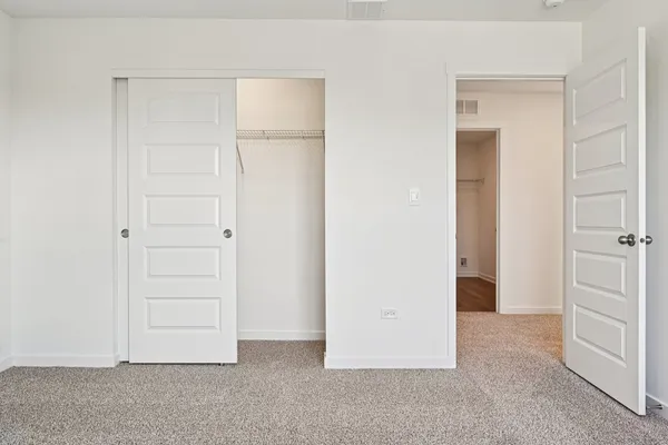 an empty room with closet