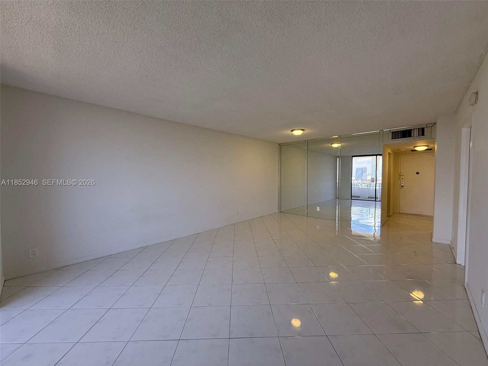 500 Three Islands Boulevard, Unit 715 Hallandale Beach, FL 33009 - Photo 7 of 16 a view of an empty room