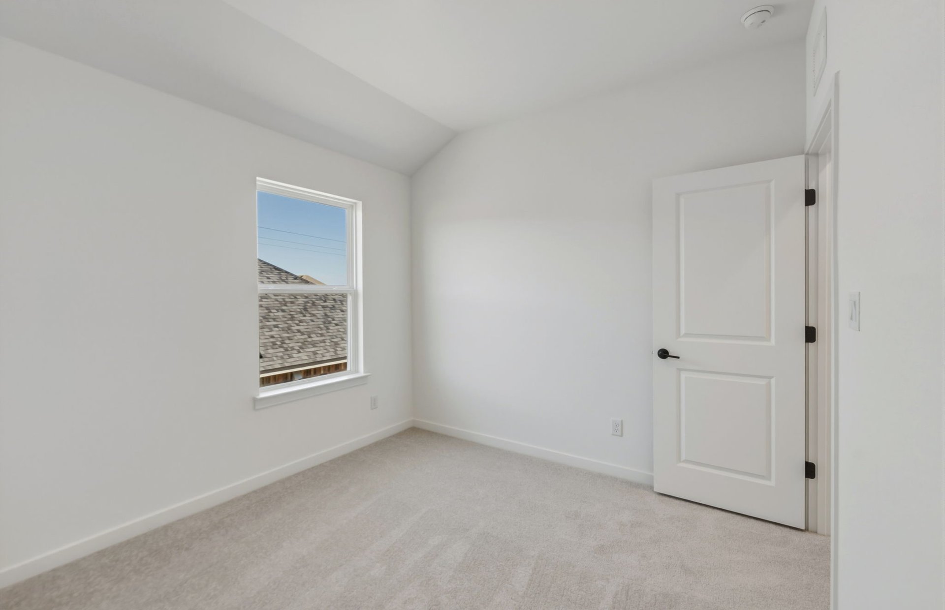 536 Rubber Tree Way Buda, TX 78610 - Photo 25 of 32 a view of an empty room and a window