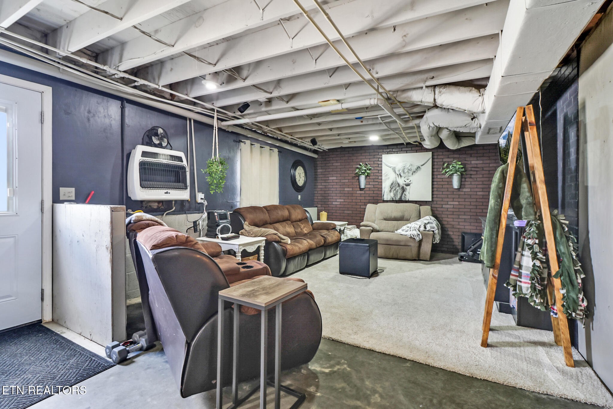 7616 Plateau Road Crossville, TN 38571 - Photo 32 of 60 a media room with lots of chairs and mirrors