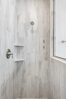 a close view of a shower in bathroom