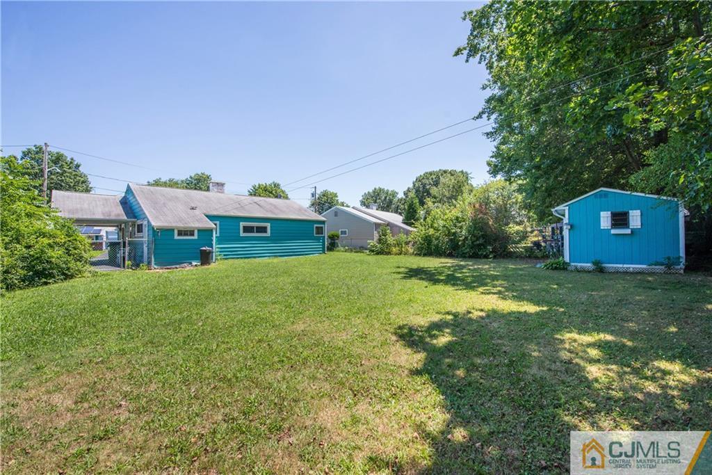 8 Baxter Road Edison, NJ 08817 - Photo 15 of 18 a view of a house with a yard