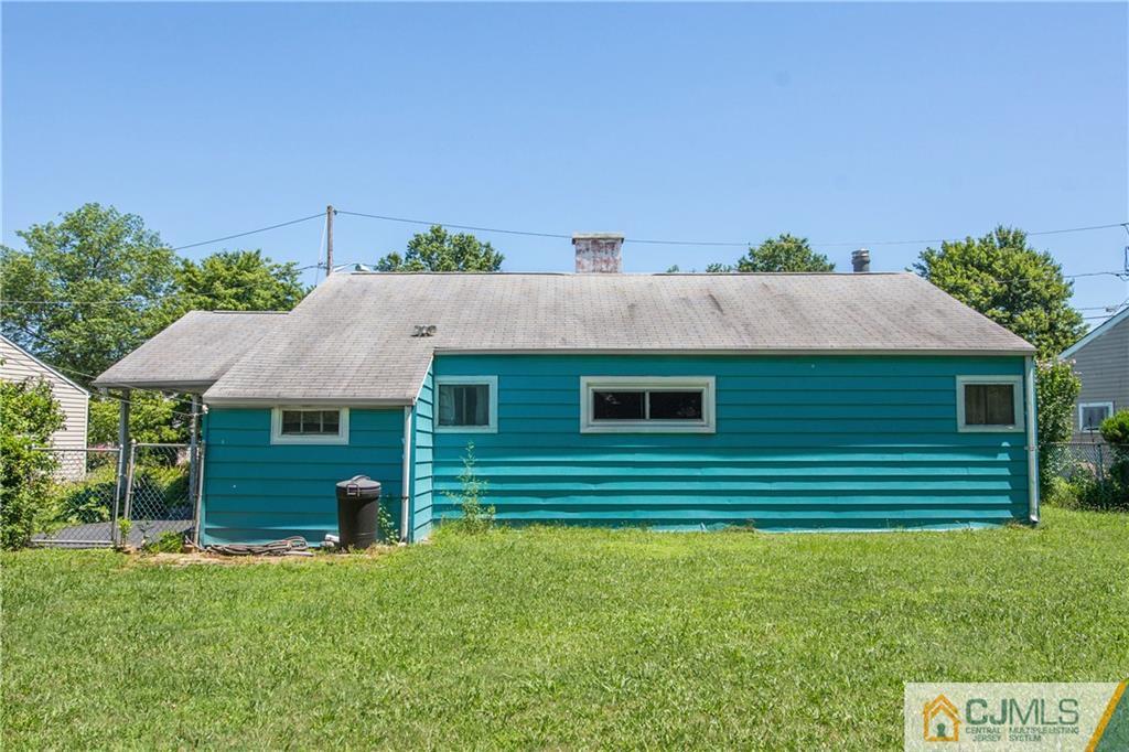 8 Baxter Road Edison, NJ 08817 - Photo 16 of 18 a front view of a house with a garden