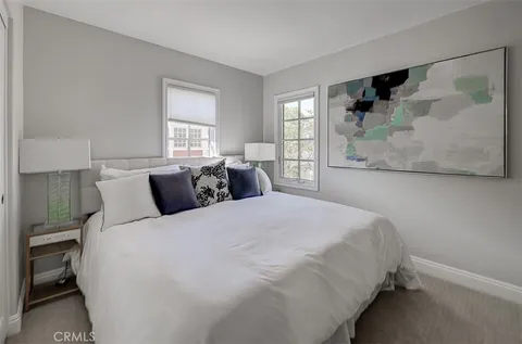 a bathroom with a sink vanity and a mirror