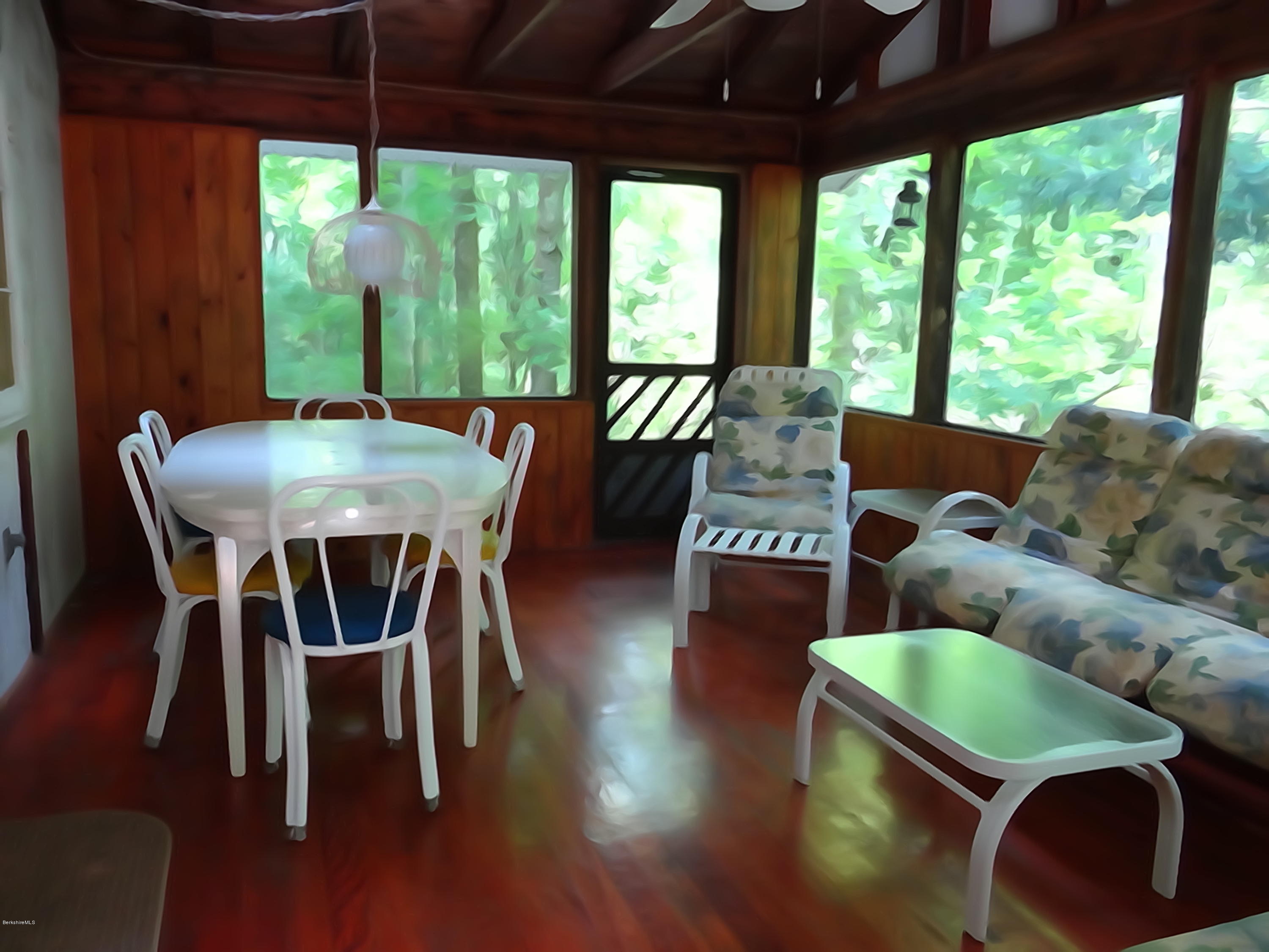 2 Woods Road Stockbridge, MA 01262 - Photo 2 of 10 a view of a dining room with furniture window and outside view