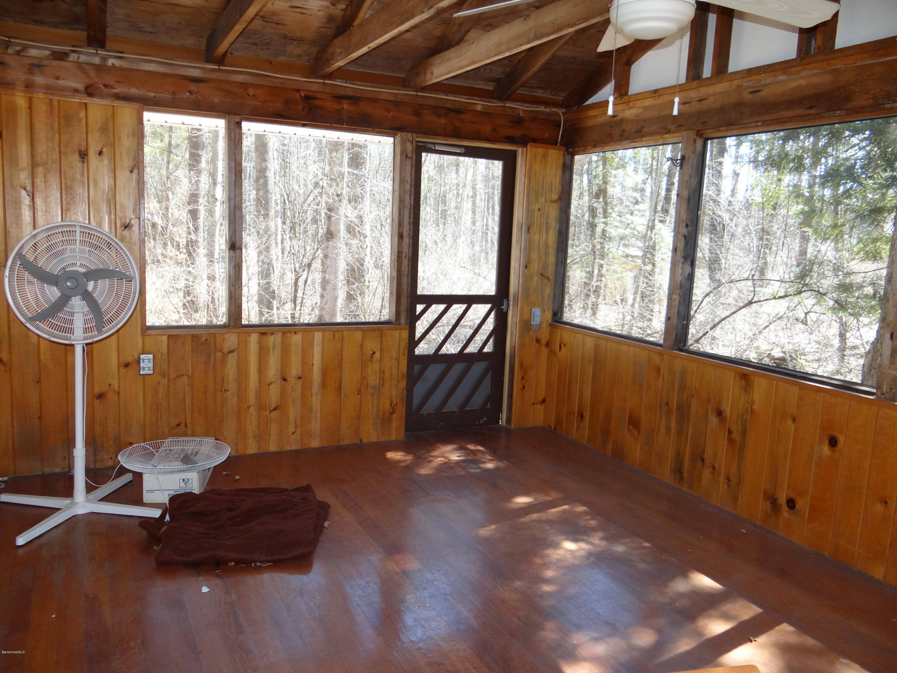 2 Woods Road Stockbridge, MA 01262 - Photo 3 of 10 a view of an empty room with a window