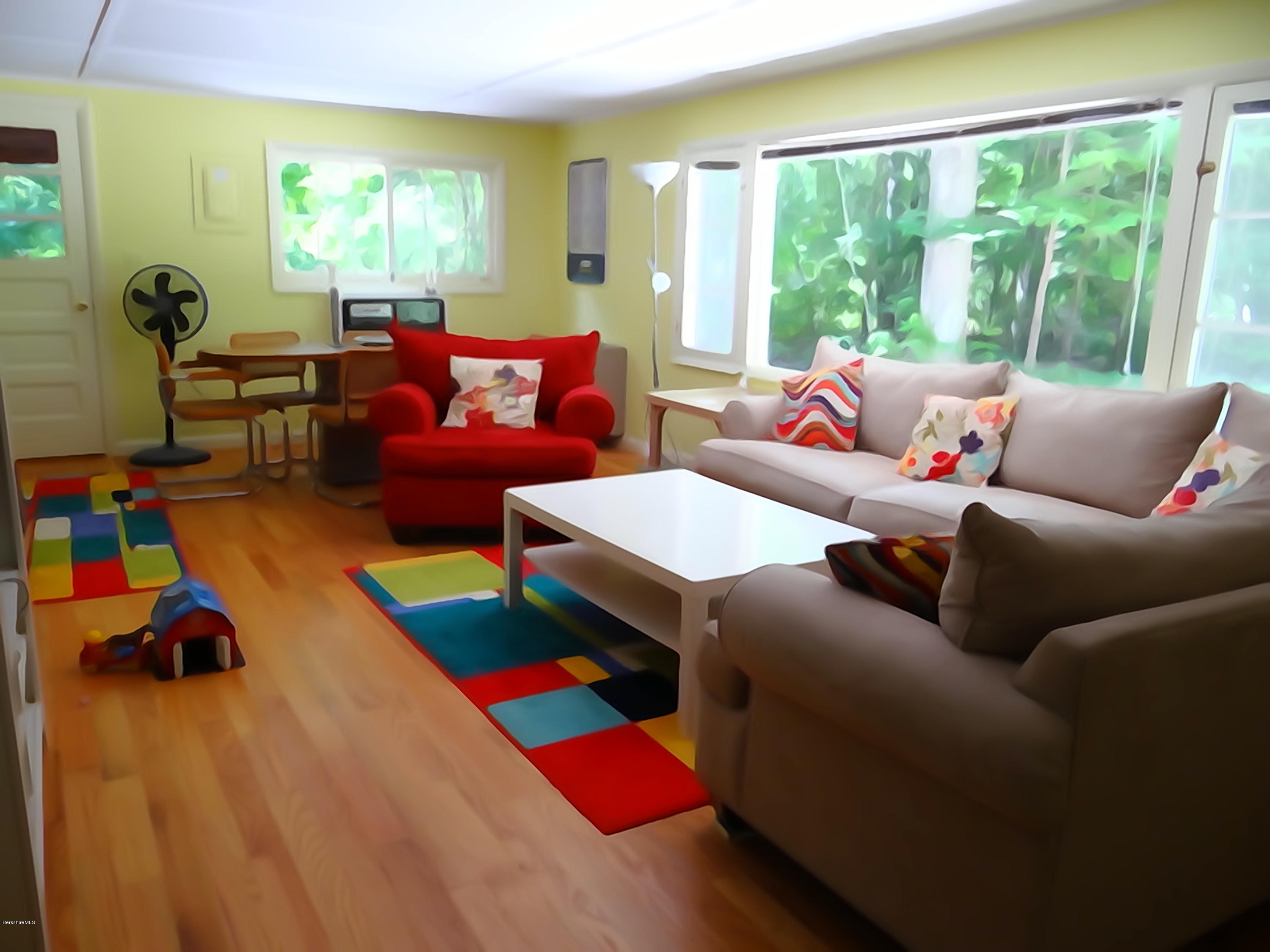 2 Woods Road Stockbridge, MA 01262 - Photo 5 of 10 a living room with furniture and a large window