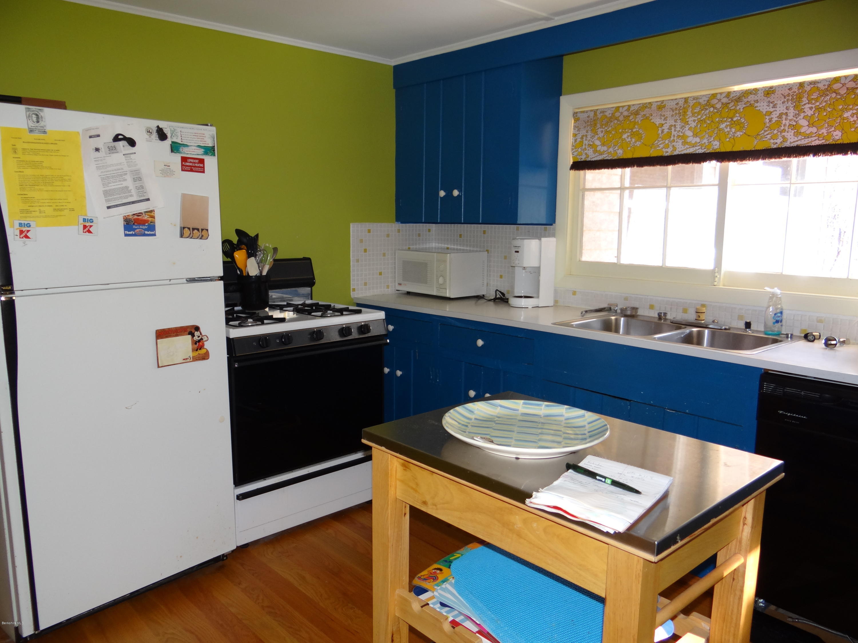 2 Woods Road Stockbridge, MA 01262 - Photo 6 of 10 a kitchen with a sink cabinets and wooden floor