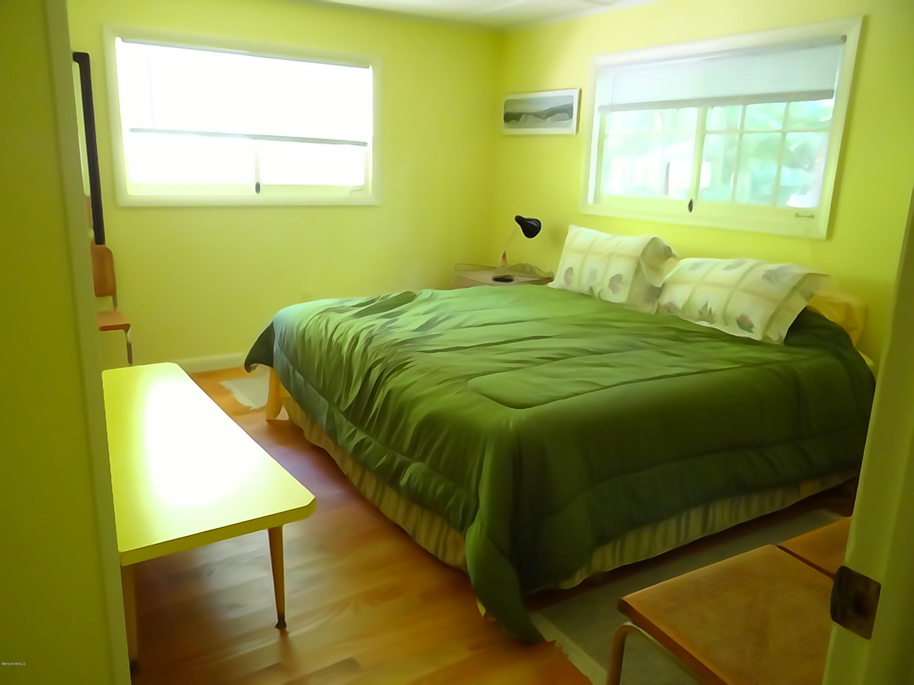 2 Woods Road Stockbridge, MA 01262 - Photo 9 of 10 a bedroom with a bed and a window
