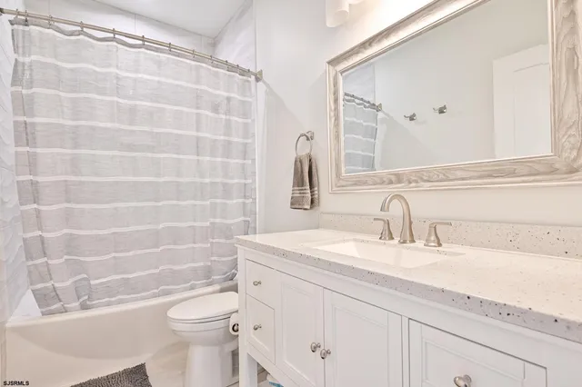 a view of a hallway with a white door