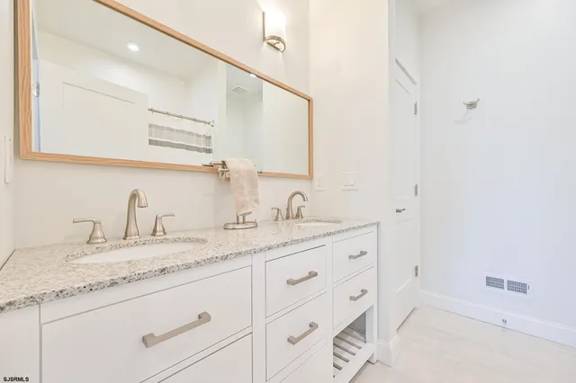 a view of a hallway with staircase