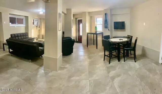 a view of a dining room with furniture