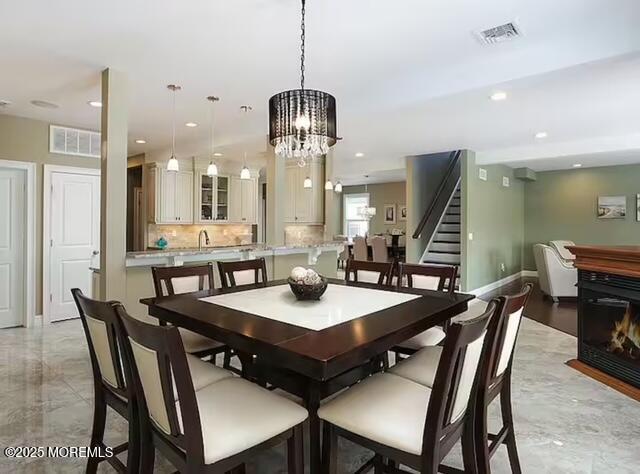 431 Hiering Avenue Seaside Heights, NJ 08751 - Photo 7 of 32 a view of a dining room and livingroom with furniture