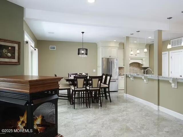 431 Hiering Avenue Seaside Heights, NJ 08751 - Photo 10 of 32 a view of a dining room with furniture