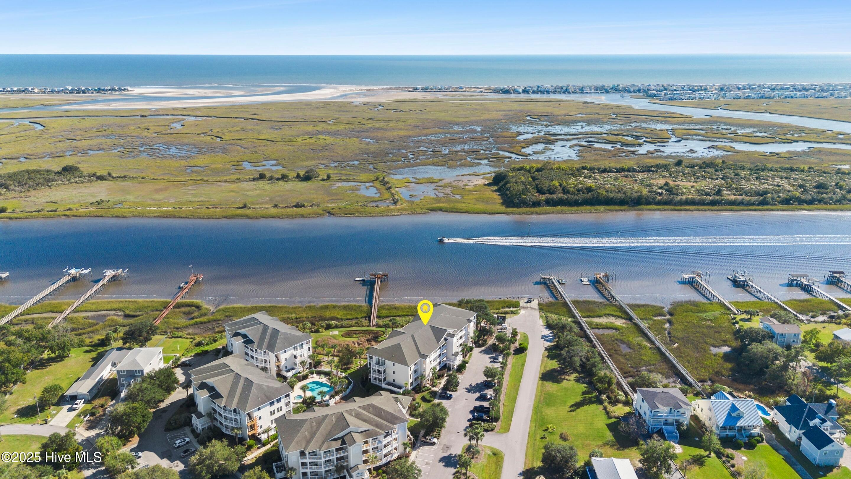 1135 Park Road Southwest, Unit 2304 Sunset Beach, NC 28468 - Photo 43 of 45 Sit and watch the boats go by!