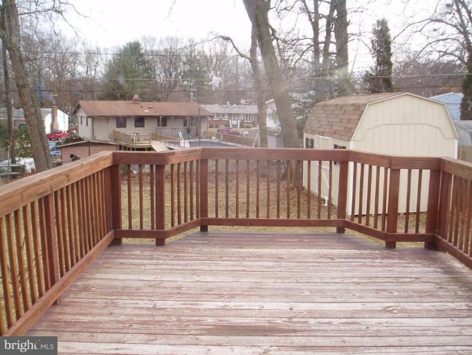 620 Banyan Road Edgewood, MD 21040 - Photo 3 of 15 a view of a house with a wooden fence
