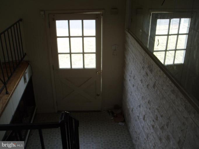 620 Banyan Road Edgewood, MD 21040 - Photo 9 of 15 wooden floor in an empty room with a window